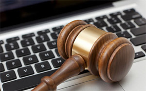 Gavel on a keyboard - legal considerations for business content