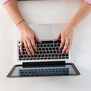 Photo of hands on a keyboard