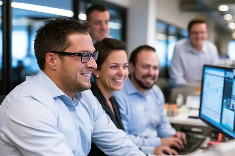 Photo of team collaborating at work