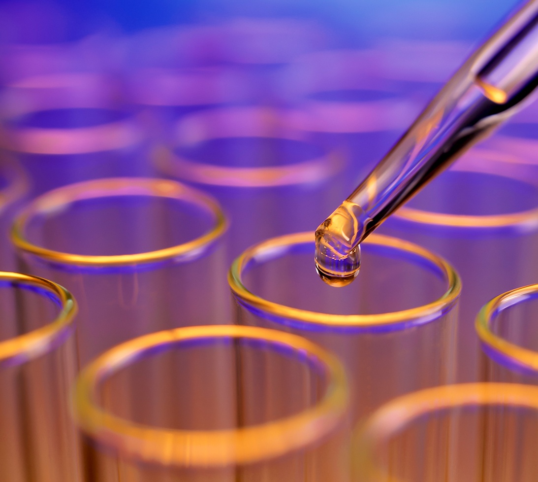 Photo of droplet going into a test tube at a laboratory