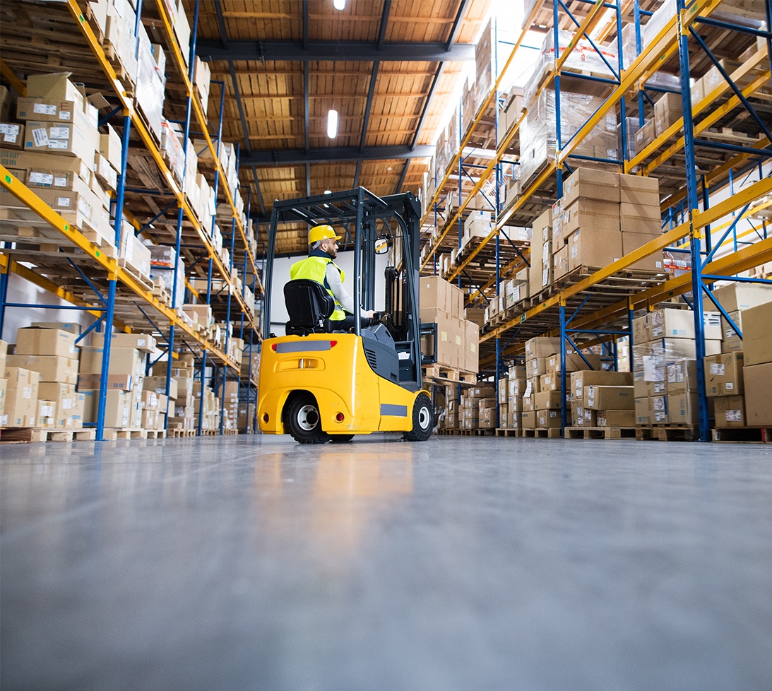 Photo of a forklift operator in a warehouse